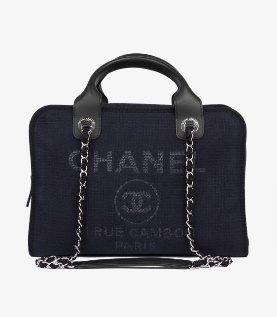A pre-loved Chanel Navy Canvas & Black Calfskin Leather Deauville Bowling Bag